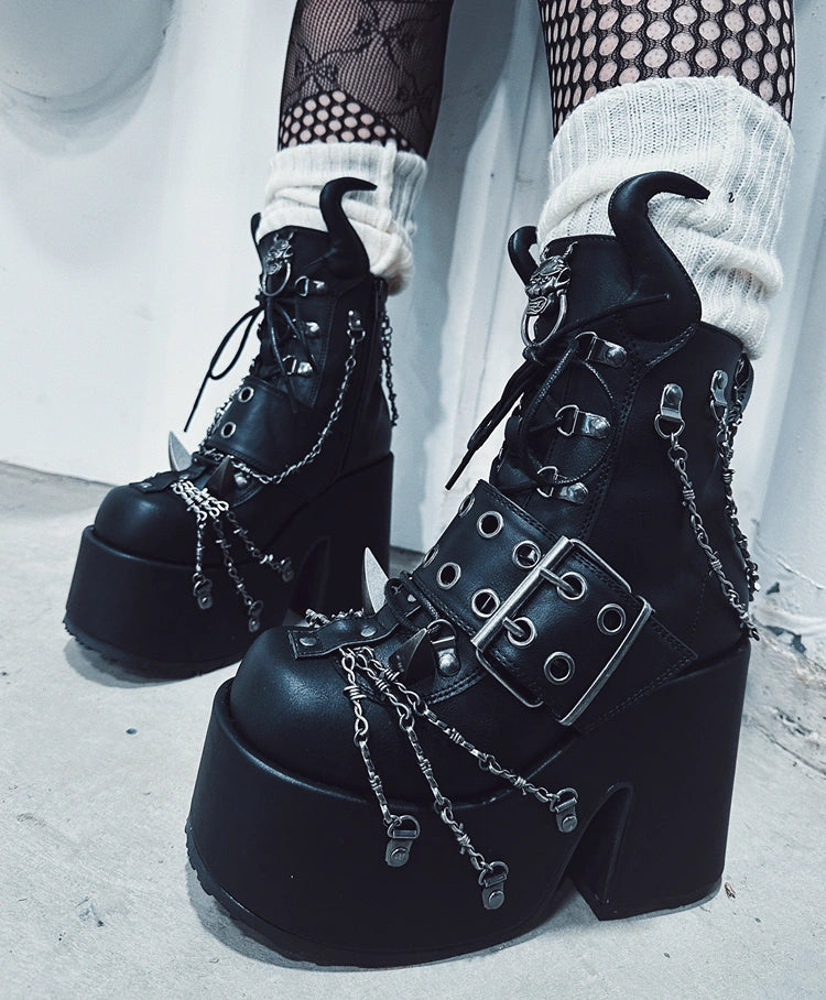 a person wearing black boots